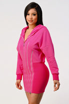 Side view of pink hoodie dress with ribbed skirt fit
