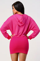 Back view of pink hoodie dress showing hooded design