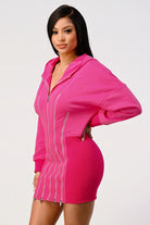 Side view of pink hoodie dress with ribbed skirt fit
