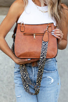Close-up of back zip pocket and strap attachments