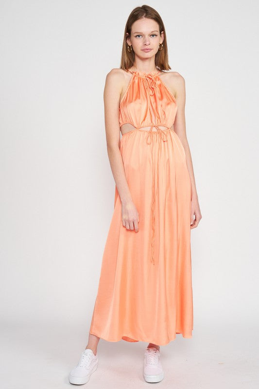 AVAH-Front view of model wearing peach satin cutout midi dress with halter neckline and flowy skirt