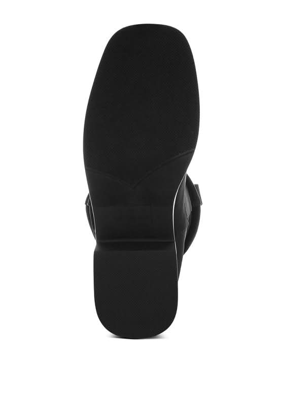 Bottom sole of black slouch boot