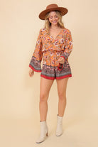 All The Right Notes Floral Print Long Sleeve Romper - Orange- Avah Couture