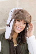 White faux fur aviator hat with ear flaps, front view
