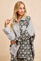 Florence Mixed Print Button Down Shirt with cream floral print, gray striped panels and contrasting chest pocket, styled with matching floral pants.