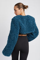 Back view highlighting plush texture and cropped silhouette