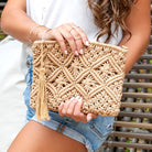 Tan Macrame Woven Clutch with tassel accent and zip closure and inside lining