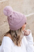 Mauve textured knit pom winter hat, side angle
