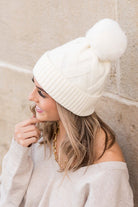 White textured knit pom winter hat, side angle
