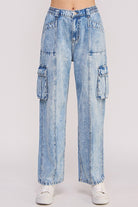 Light blue denim cargo pants on a white background