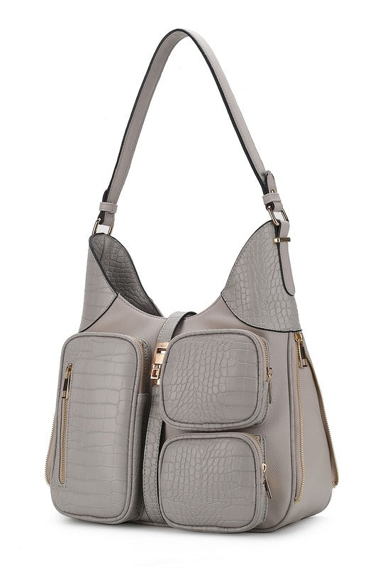 Light grey croc-textured handbag with multiple zip pockets and gold-tone accents