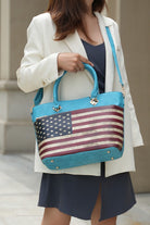 Handheld turquoise tote bag with distressed American flag design