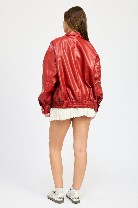 Back view of oversized red faux leather jacket with gathered waist