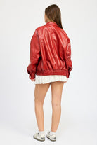Back view of oversized red faux leather jacket with gathered waist