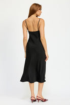 Back view of black satin slip midi dress with adjustable camisole straps.