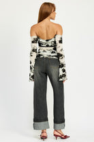 Back view of off-shoulder floral long sleeve mesh top
