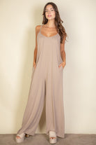 Taupe wide leg jumpsuit front view relaxed fit
