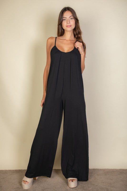 Black wide leg jumpsuit front view relaxed fit
