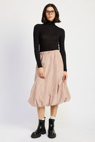 Light mauve bubble midi skirt styled with black top, front view
