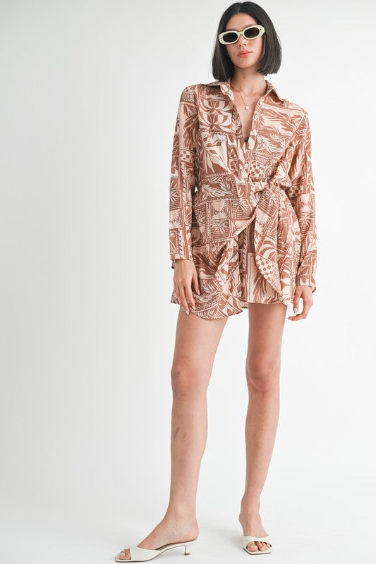 Front view of model wearing printed button-up shirt dress with belt and white heels-AVAH