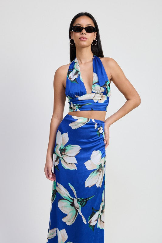 Front view of cobalt blue floral halter crop top with matching maxi skirt
