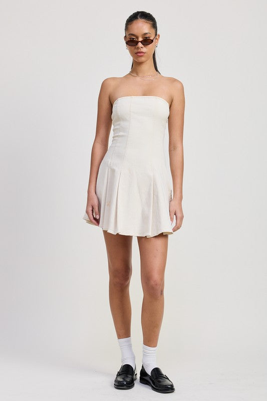 Full front view of model in strapless ivory mini dress with loafers and socks