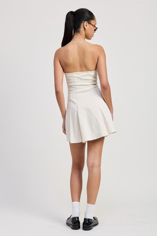 Back view of strapless mini dress showing flare and zipper closure