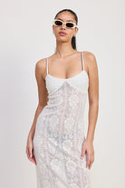Close-up of bust and straps on sheer floral lace beach dress