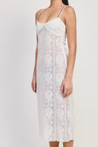 Side view of lace midi dress with floral pattern and soft drape