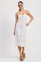 Model in white sheer lace midi cover-up dress over bikini with platform sandals-AVAH