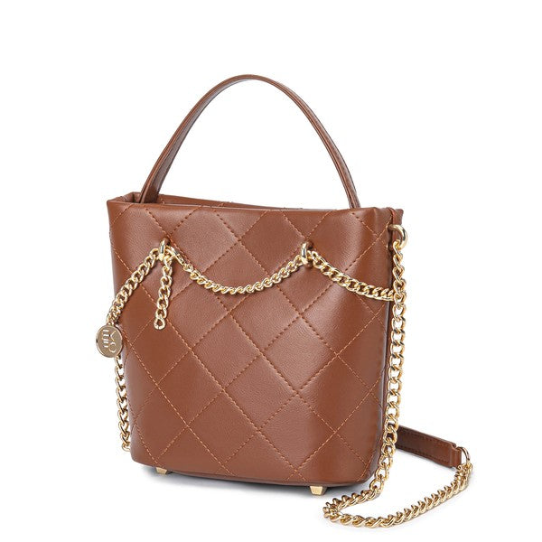 Studio shot of brown faux leather bag with diamond stitching
