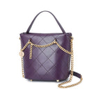 Deep purple quilted handbag with gold chain detail and top handle
