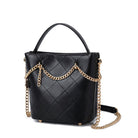 Black quilted mini bucket bag with gold chain strap and top handle
