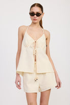 AVAH-Front view of ivory halter tie-front top with matching shorts