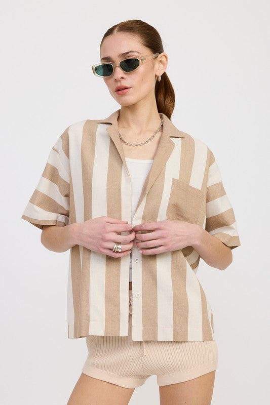 Model wearing mocha striped short sleeve button-up shirt with vertical and horizontal stripes, styled with ribbed knit shorts and layered tank-AVAH