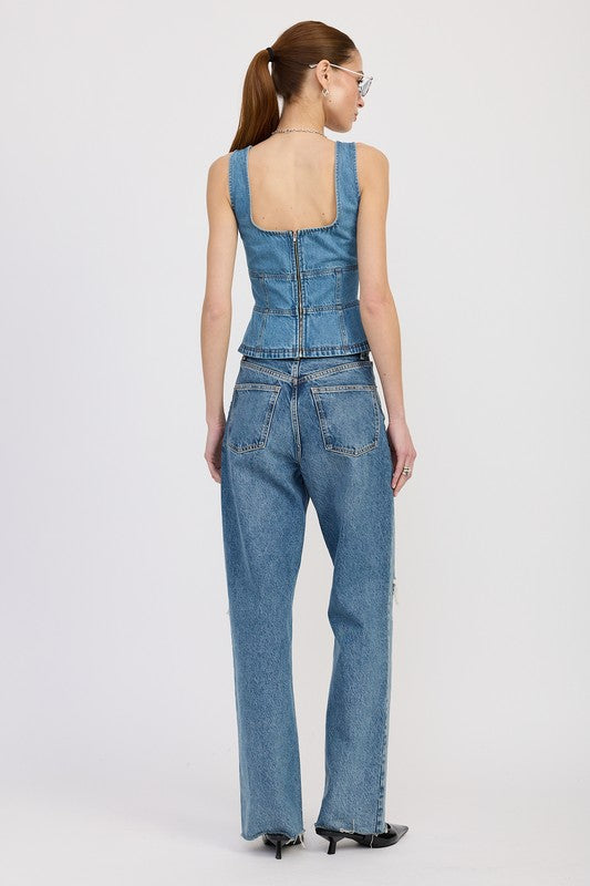 Back view showing zipper closure on denim bustier top