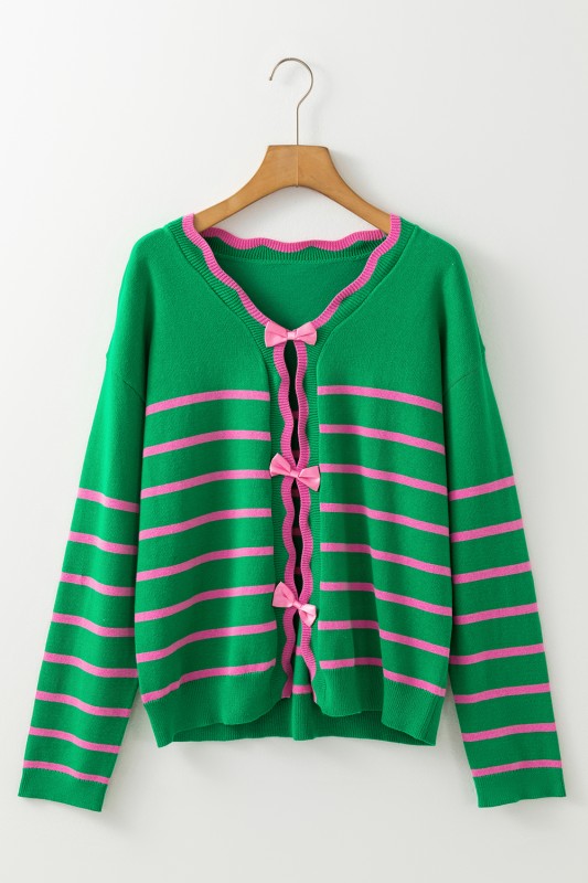 Green and pink striped cardigan displayed on hanger, front view