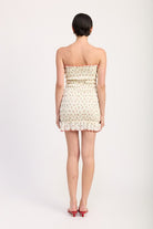 Rear view of smocked strapless cherry mini dress with full back ruching