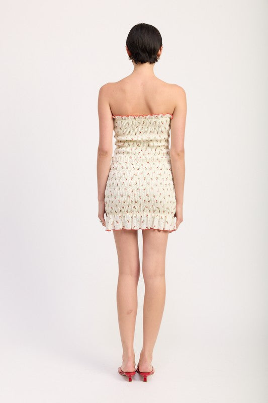 Rear view of smocked strapless cherry mini dress with full back ruching