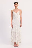 AVAH-Front view of white polka dot maxi dress with tiered ruffle hem