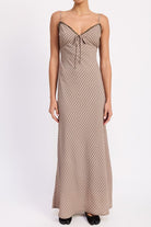 Front view of grid print maxi dress with lace-trim neckline and adjustable straps