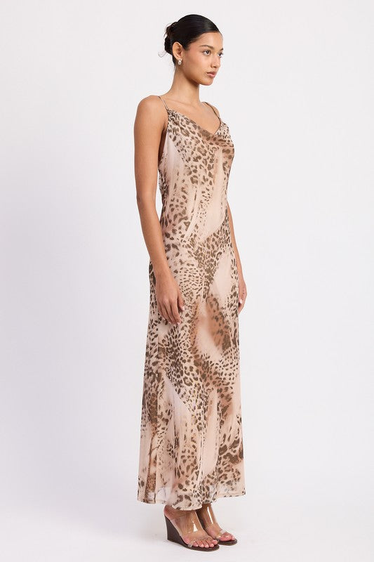 Side profile of model in cheetah print maxi slip dress with bias-cut silhouette