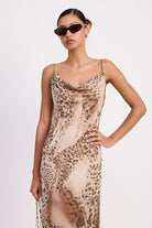 Close-up of leopard print cowl neckline and spaghetti straps on slip dress