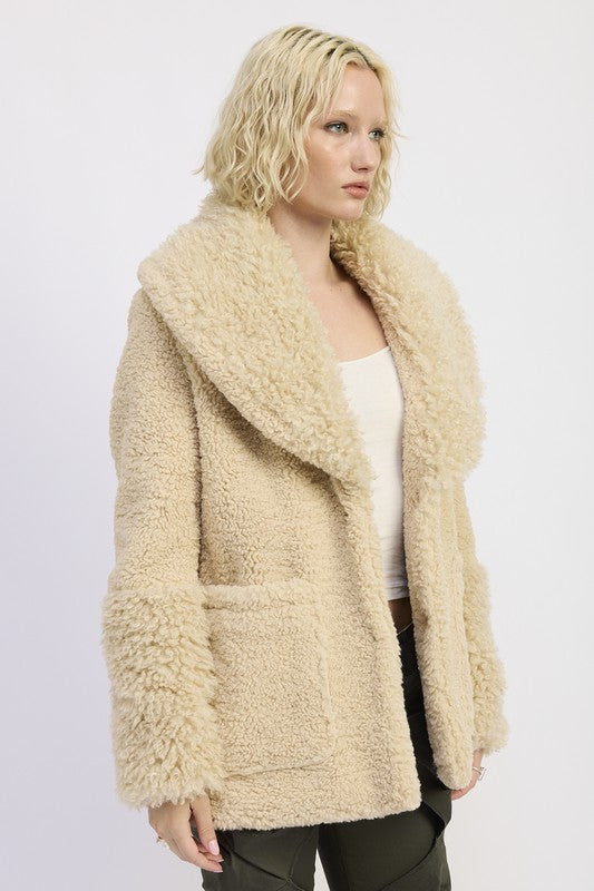 Side angle of beige taupe teddy sherpa coat with relaxed fit and pockets-AVAH