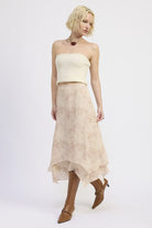 Side view of Wild Rose layered midi skirt with handkerchief hem and flowy layered design
