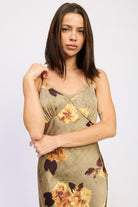 Close-up of AVAH floral olive maxi dress with lace trim neckline and bust detail.