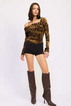 Leopard off-shoulder bodysuit styled with black shorts
