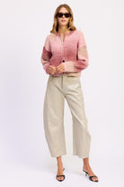 Full look featuring blush gradient zip sweater with wide-leg pants.
