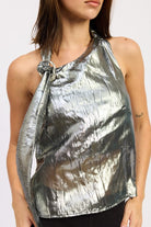 Close-up of black silver metallic halter top showing the knot detail and crushed metallic texture.