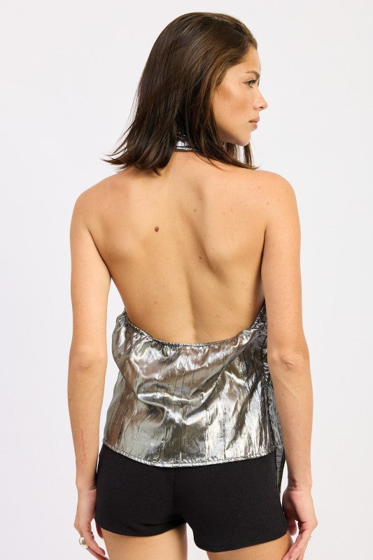 Back view of black silver metallic halter top showing open-back design and elastic edge.